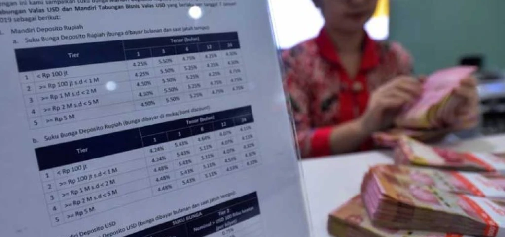 Penyebab Lambatnya Transmisi Suku Bunga Kredit usai BI Rate Dipangkas